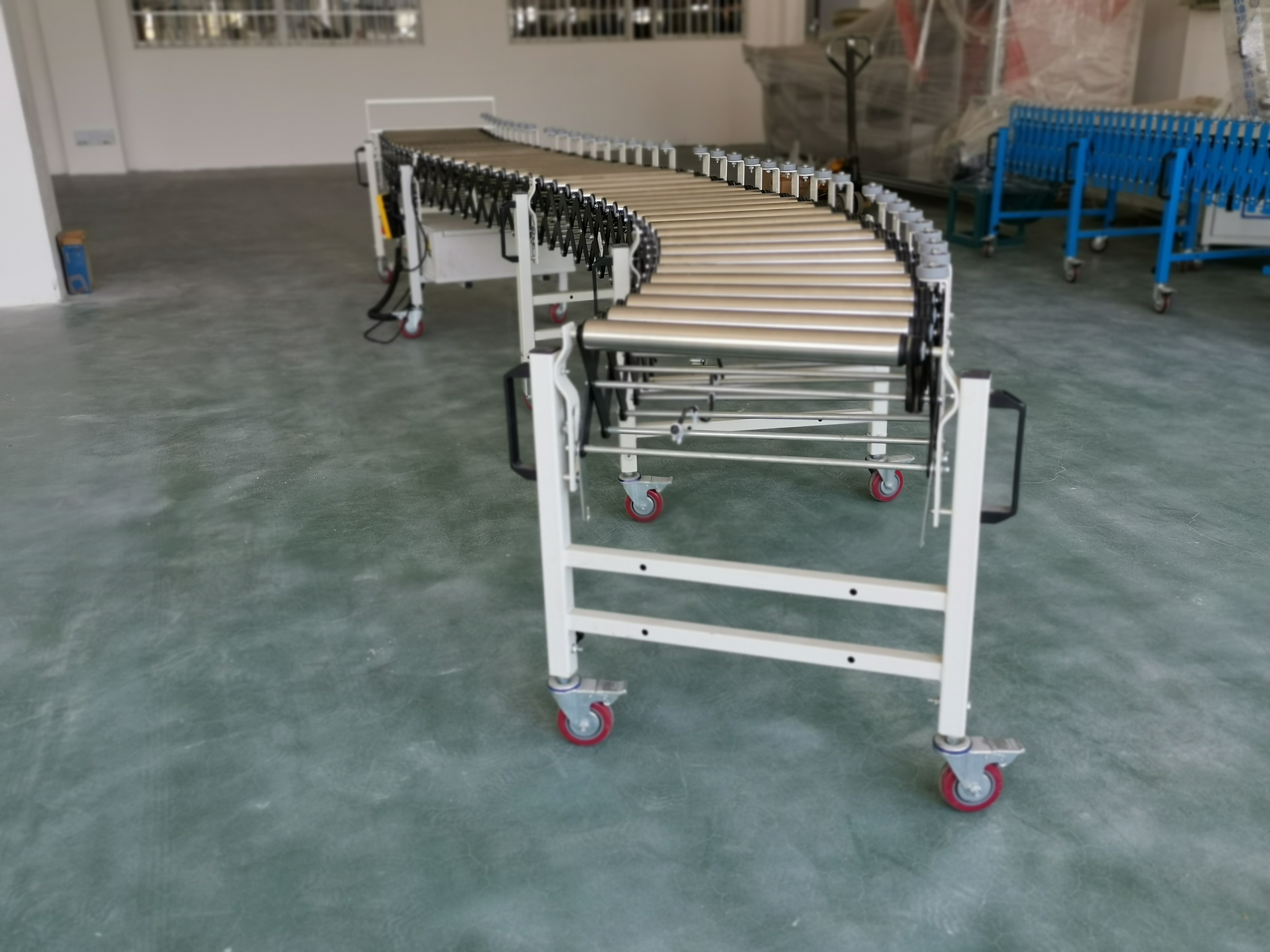 transportador de rolos flex&iacute;veis com guarda lateral